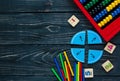 Creative ÃÂ¡olorful math fractions on dark background. Interesting funny math for kids. Education, back to school